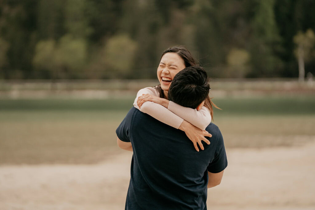 Happy couple embracing at the beach