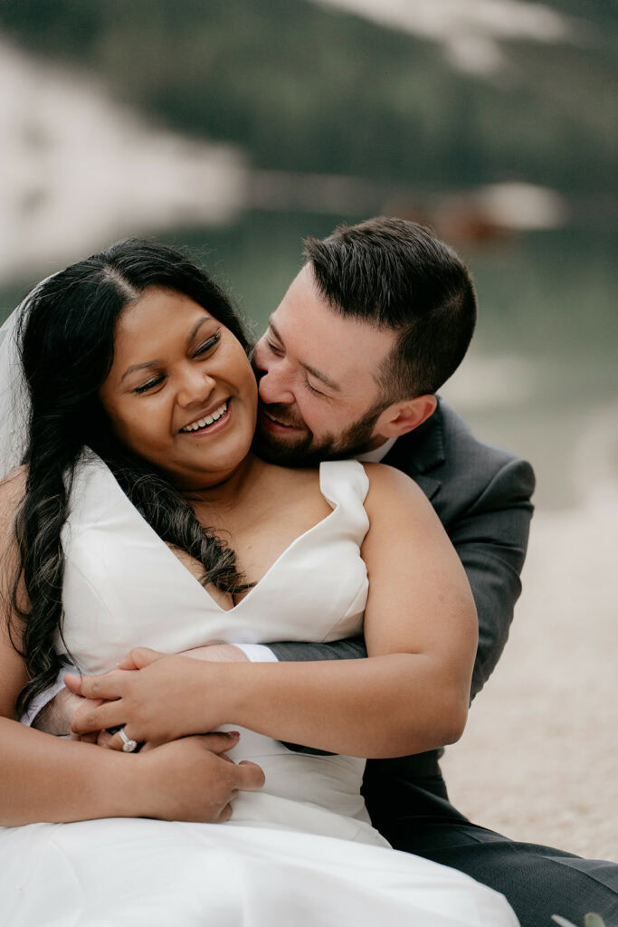 Smiling couple hugging on wedding day
