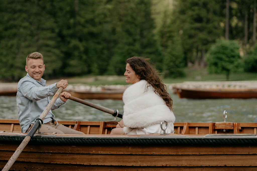 Couple rowing boat on a lake