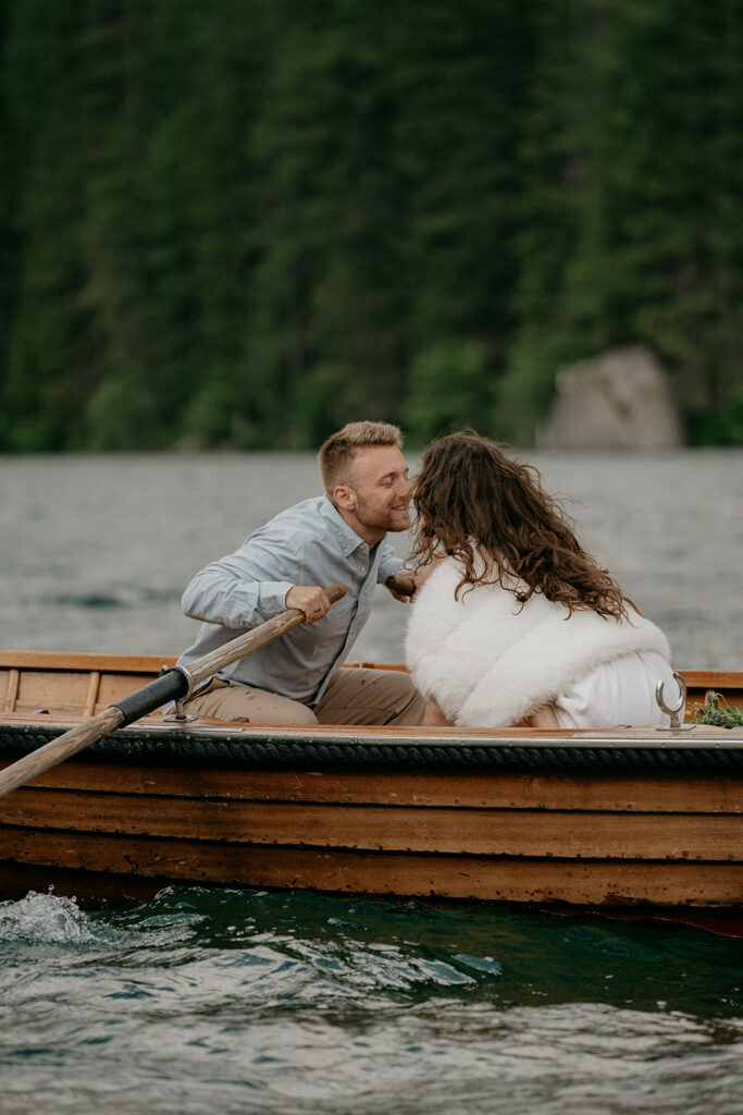 Couple on a boat, sharing a romantic moment