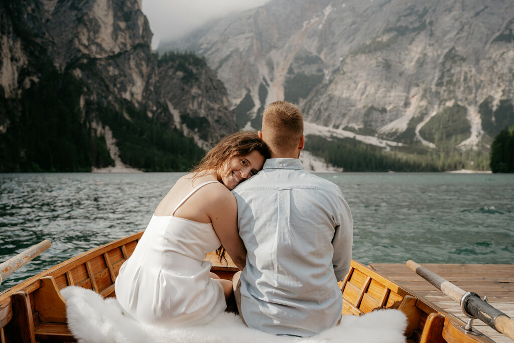 Couple on a boat with mountain view