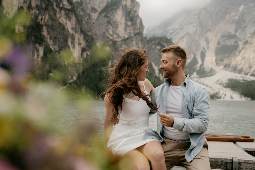 Couple enjoying lake view in mountains