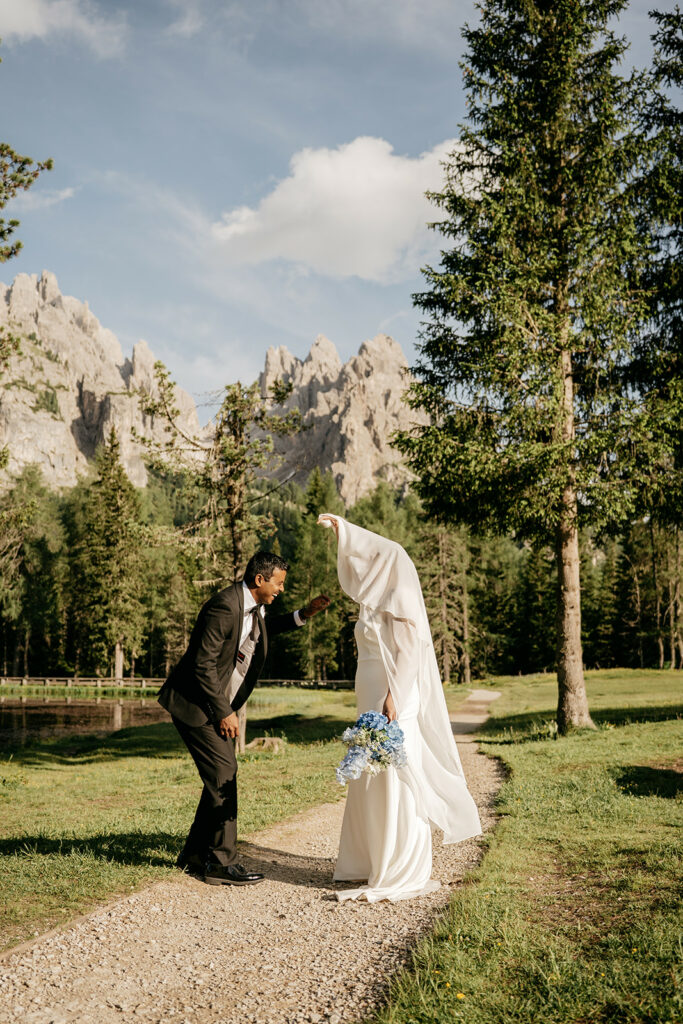 Bride and groom in scenic mountain wedding.