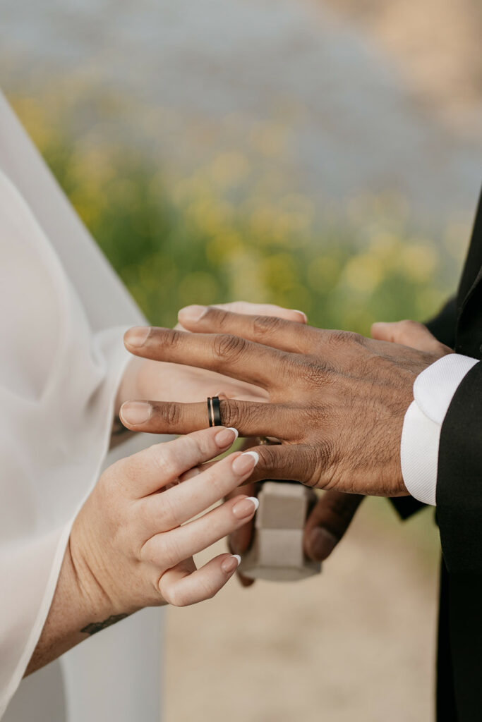 Exchanging wedding rings during ceremony