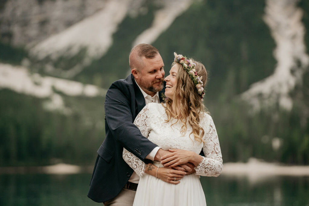 Happy couple embracing in scenic landscape