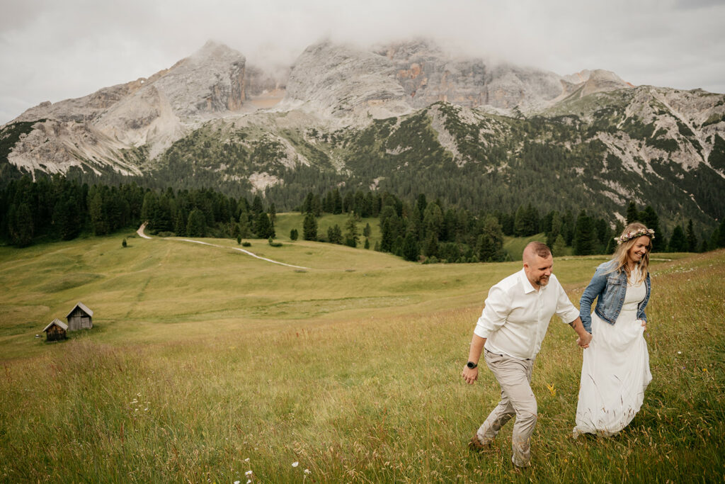 Couple hiking in scenic mountain landscape