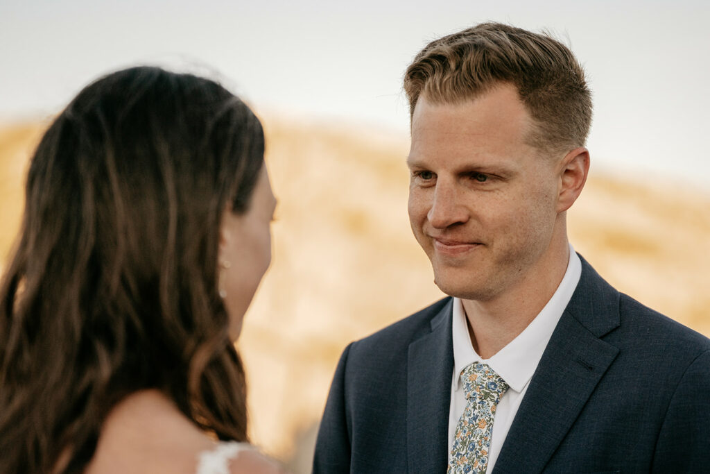 Couple exchanging vows outdoors