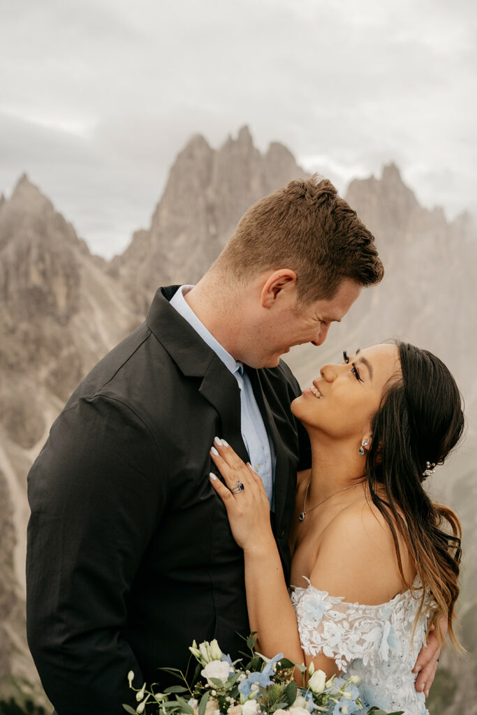 Couple embracing in mountainous landscape