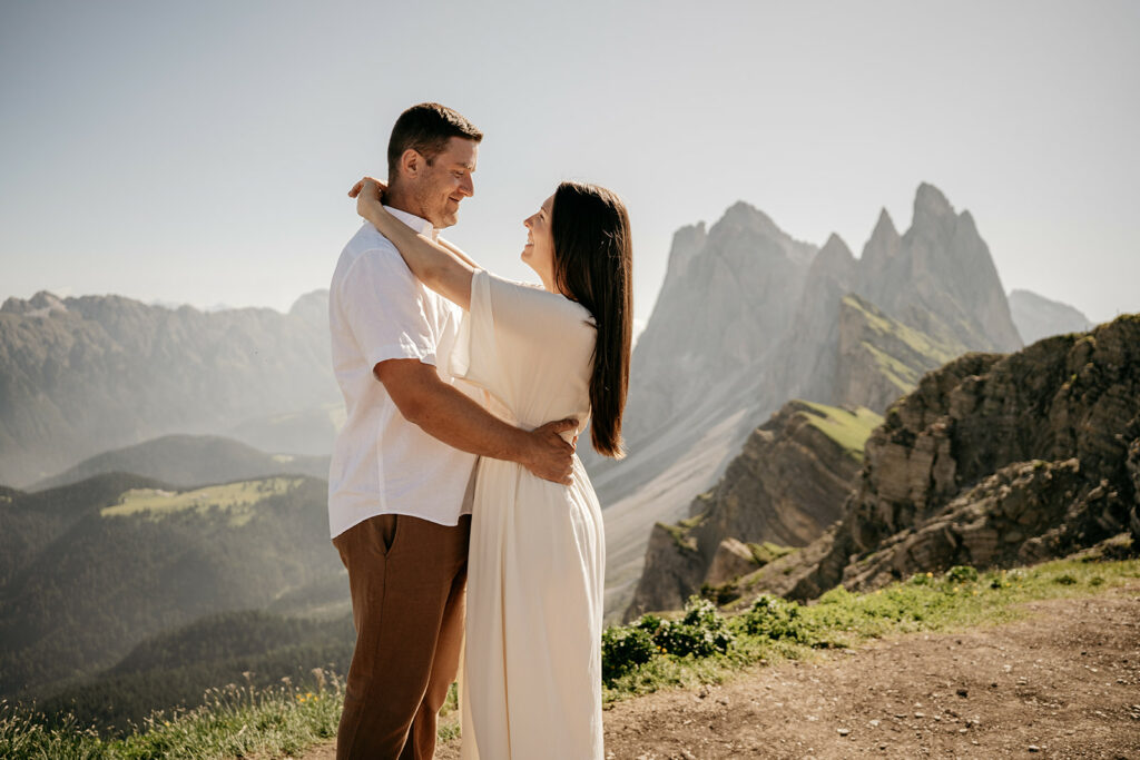 Couple embracing in mountain landscape
