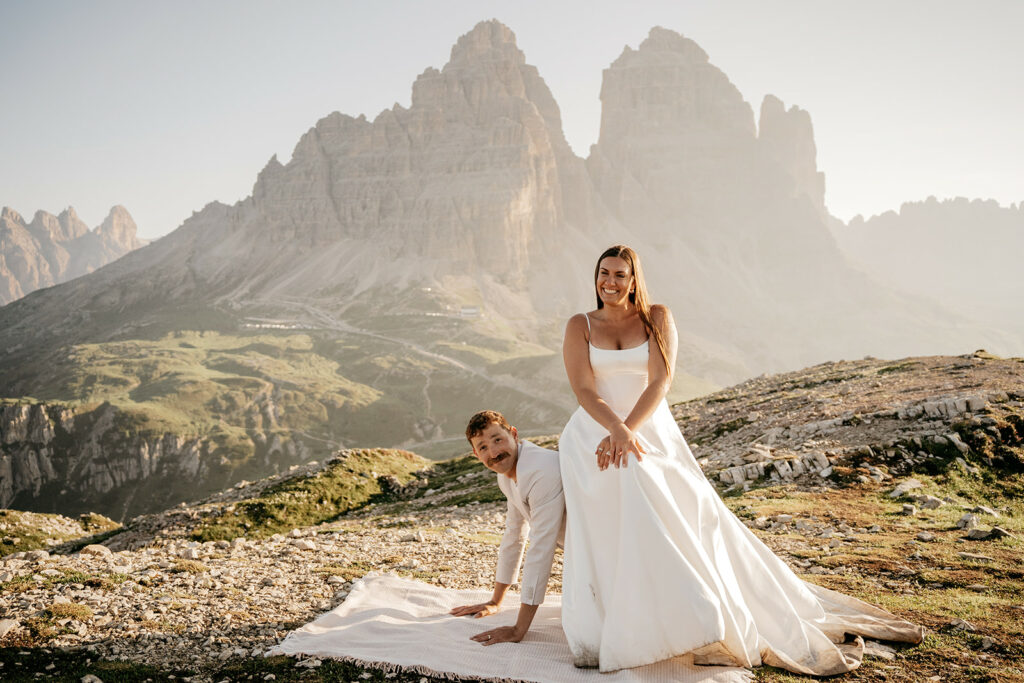 Wedding couple posing in mountain landscape