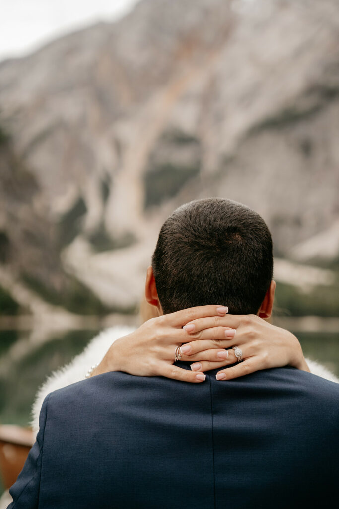 Couple embracing with mountain view background