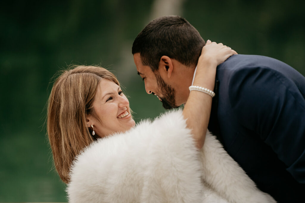 Smiling couple embracing outdoors