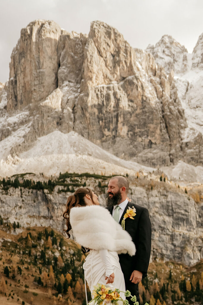 Bride and groom in mountains wedding scene.