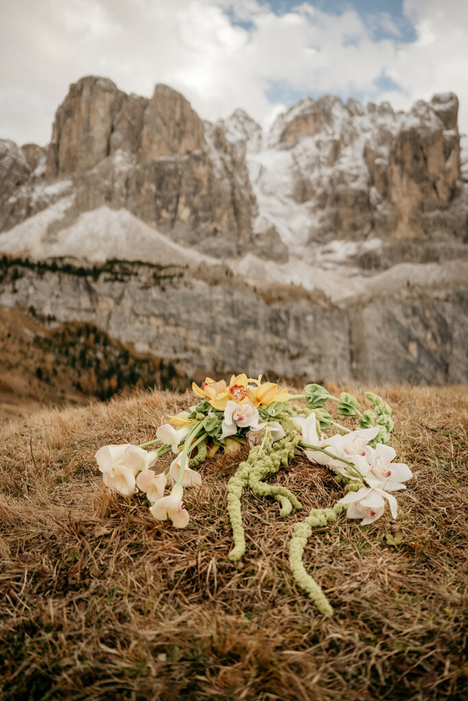 Orchid bouquet on mountain landscape background