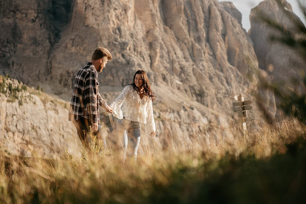 Couple hiking in scenic mountain landscape