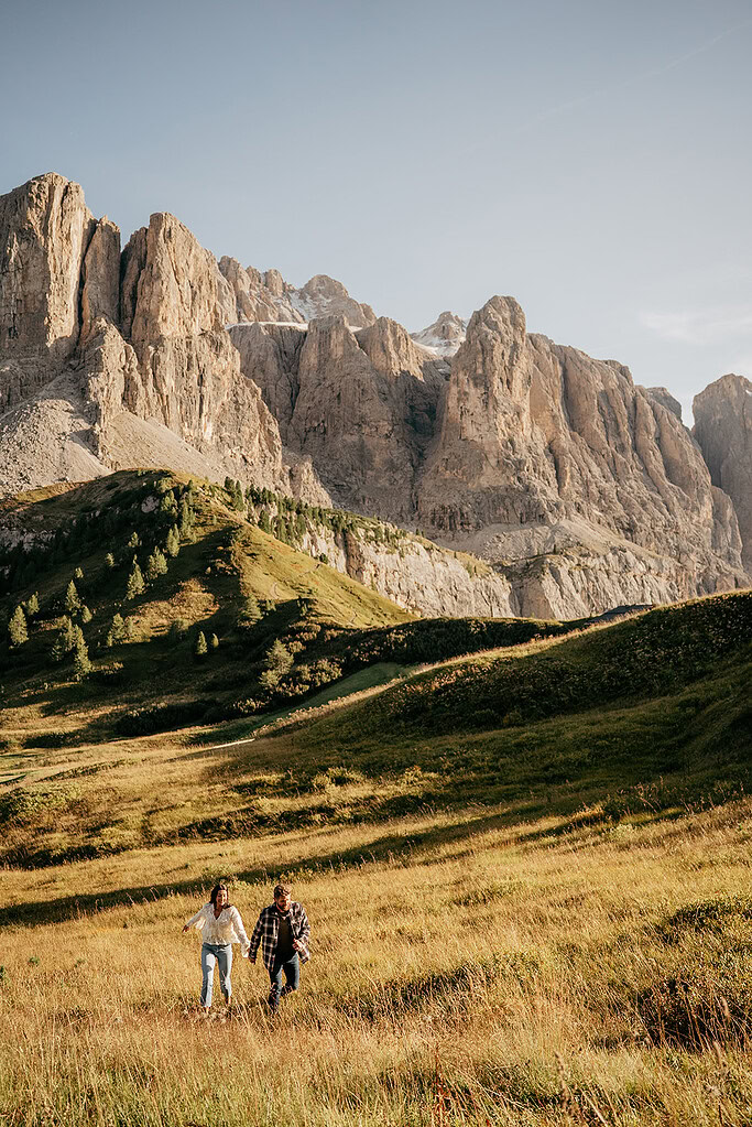 Couple hiking in scenic mountain landscape