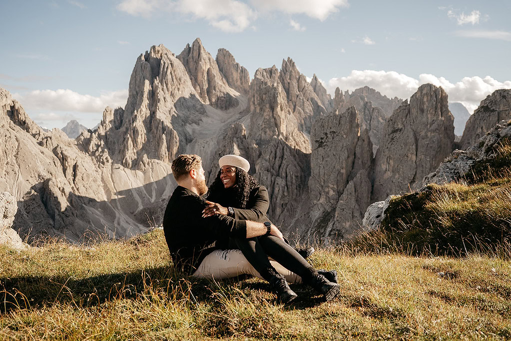 Couple smiling in mountain landscape