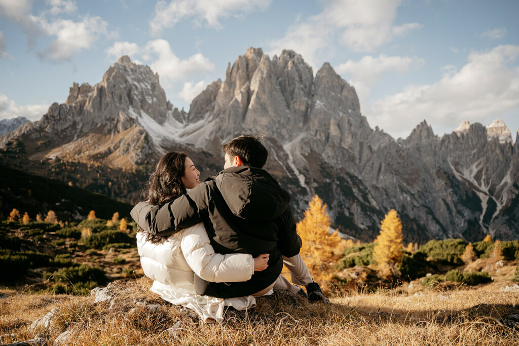 Couple embracing with mountain scenery