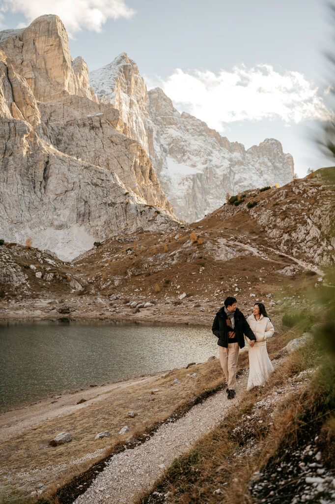 Couple walking in scenic mountainous landscape