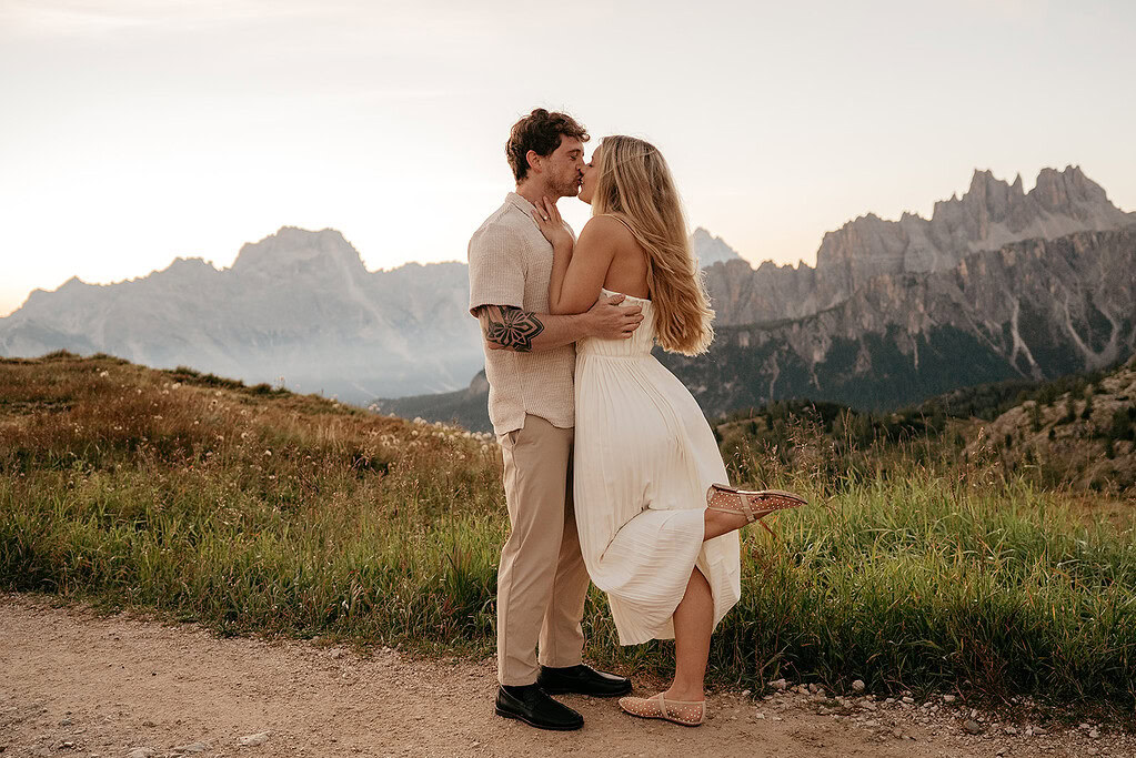 Couple embracing in scenic mountain landscape