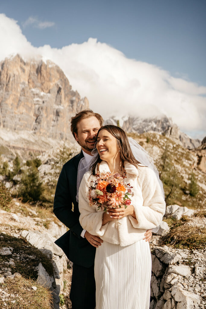 Happy couple in mountainous wedding setting