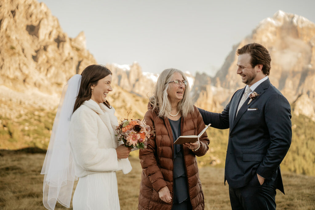 Wedding ceremony outdoors with mountains background
