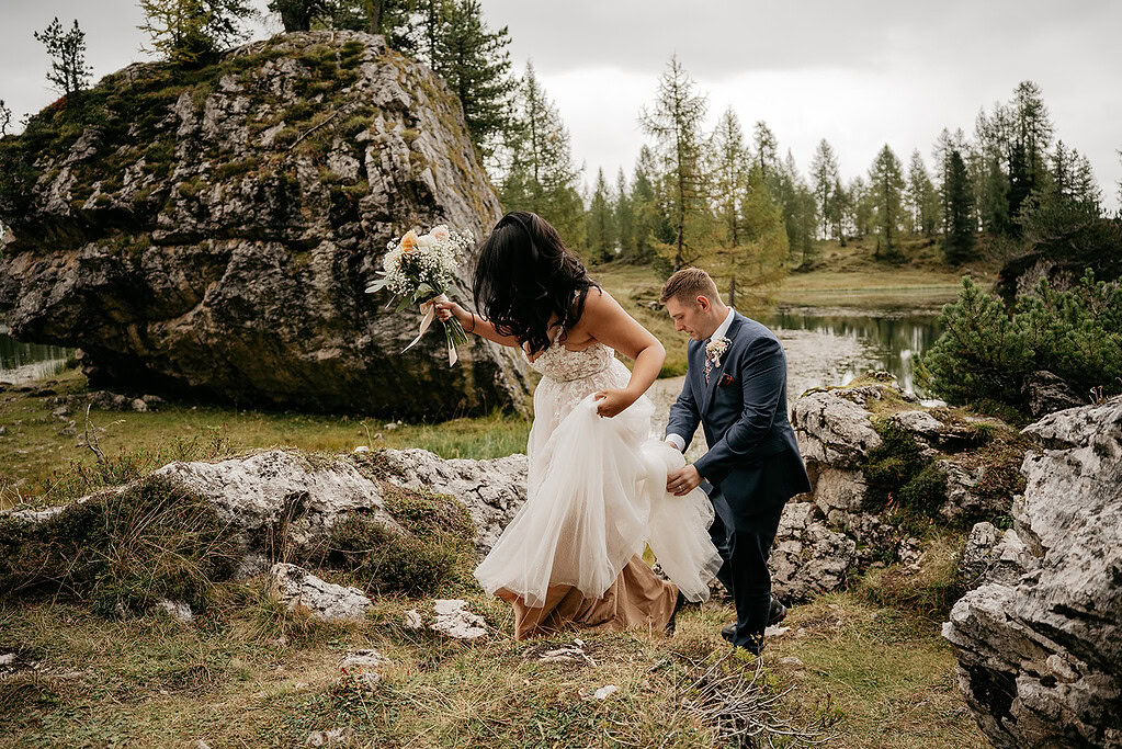 Bride and groom in rocky outdoor setting