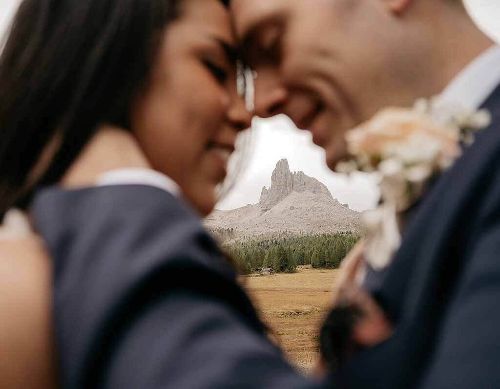 Close romantic embrace in mountain landscape