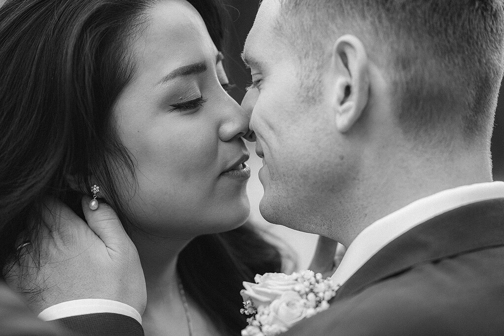 Couple sharing a romantic kiss, close-up
