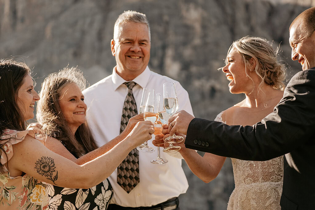 Group toasting with champagne outdoors